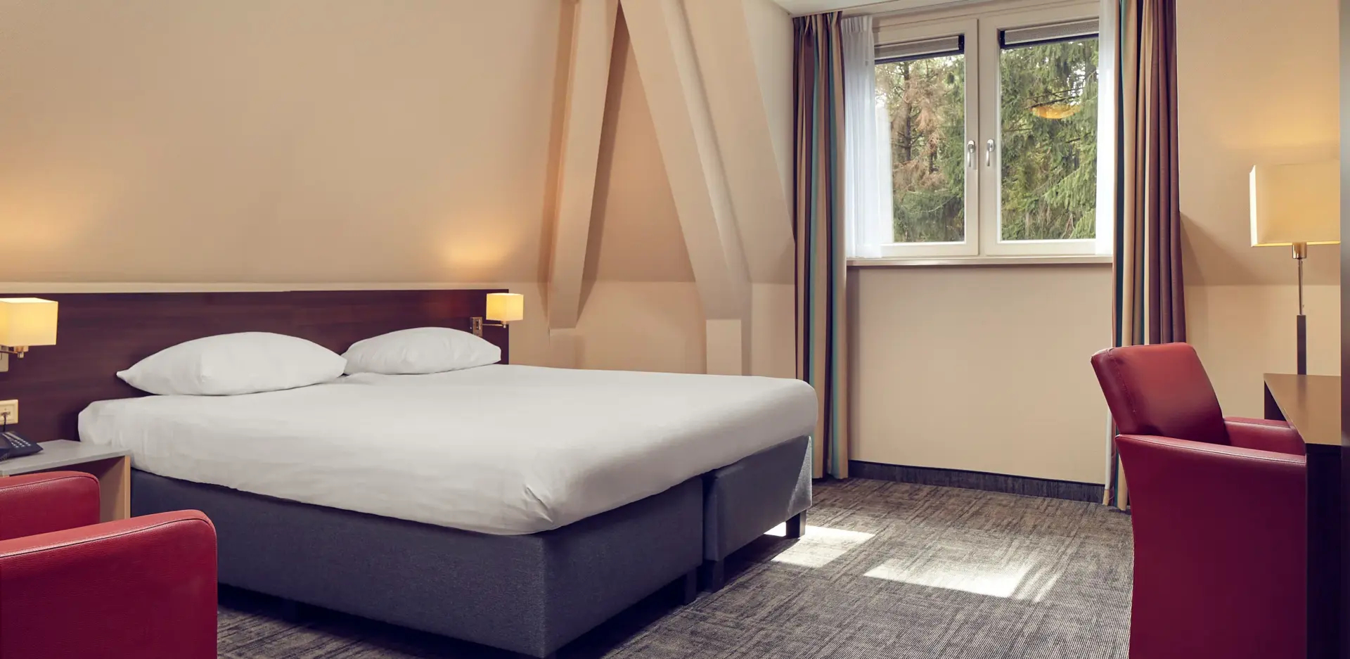 Deluxe hotelkamer met bad bij Hotel de Werelt Garderen