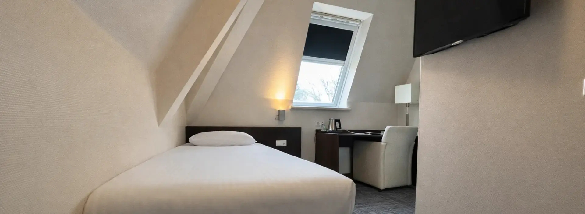 Eenpersoonskamer bij Hotel de Werelt Garderen